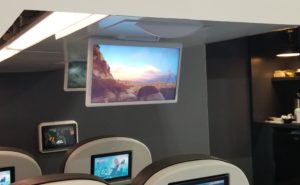 Large overhead screen on aircraft, supplied by Burrana
