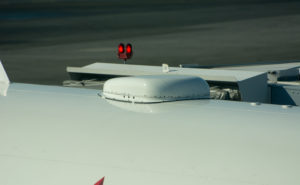 Antenna radome (hump) atop an aircraft fuselage