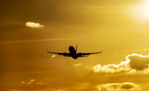 A 737 flies into the sunset.