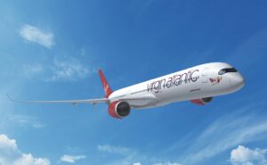 A350-1000 with Virgin Atlantic livery flying in a clear blue sky