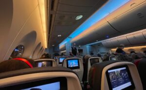 Cabin of Air Canada's Boeing 787-9 with LED lighting and IFE in view
