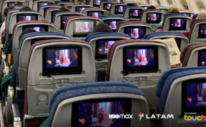 LATAM cabin showing Sex and The City on all of the seatback IFE