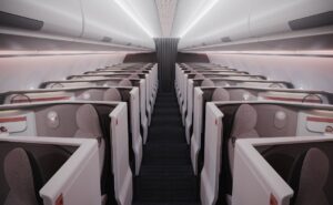 Computer generated image of Unum business class seats in an aircraft cabin. Ghostly like figures sit in the seats.