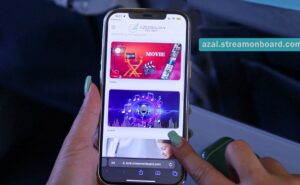 A passenger is steaming on the AZAL wireless entertainment system from their mobile device.