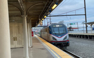 Amtrak train arriving at LNC station.